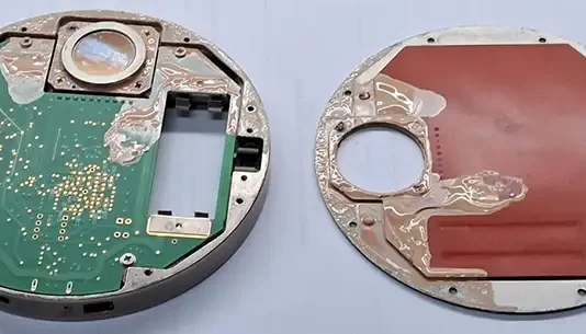 Unit sent back for service after taking a swim in some coating.